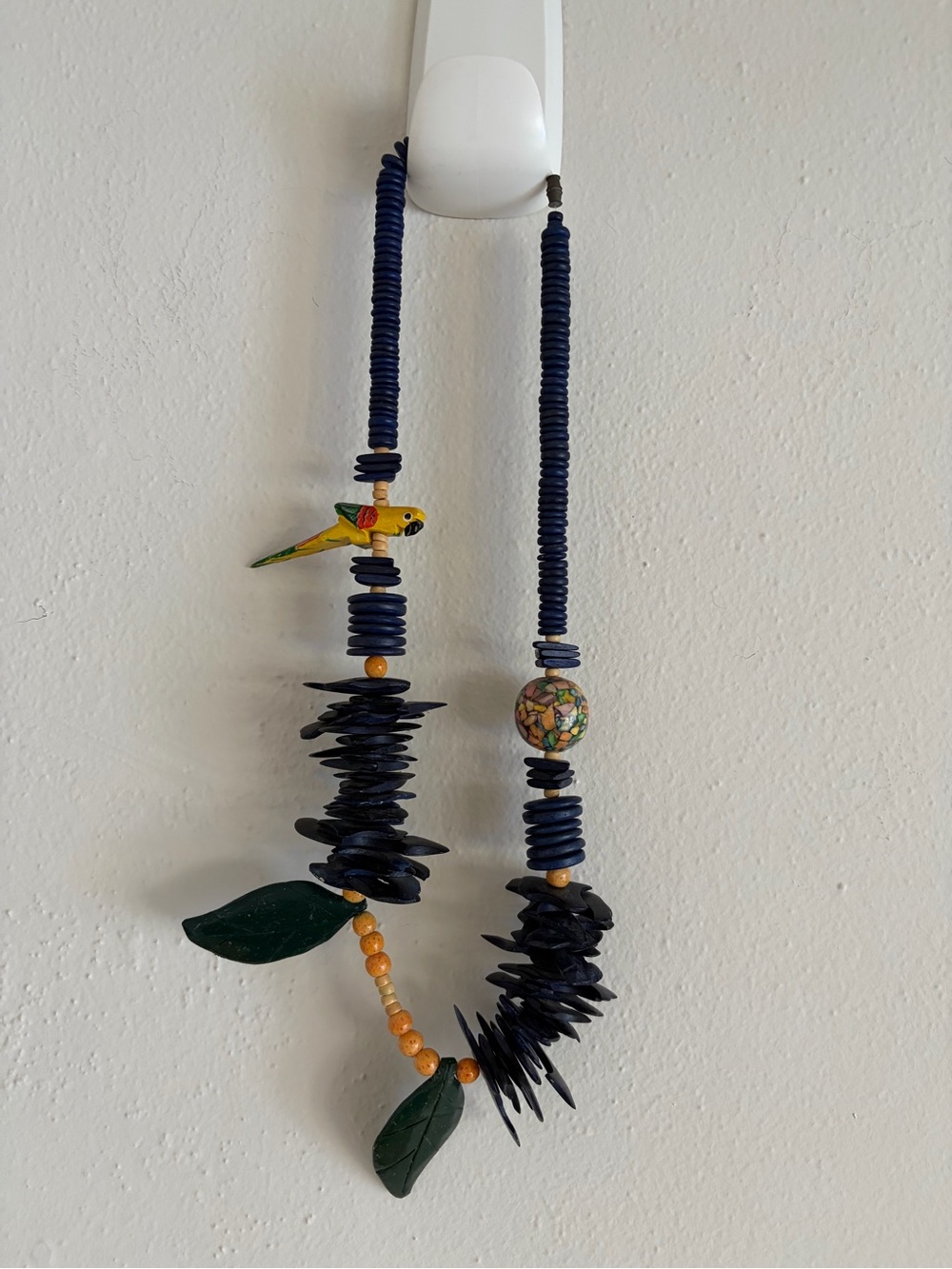 Handmade Blue Bead Necklace with Parrot and Leaf Accents